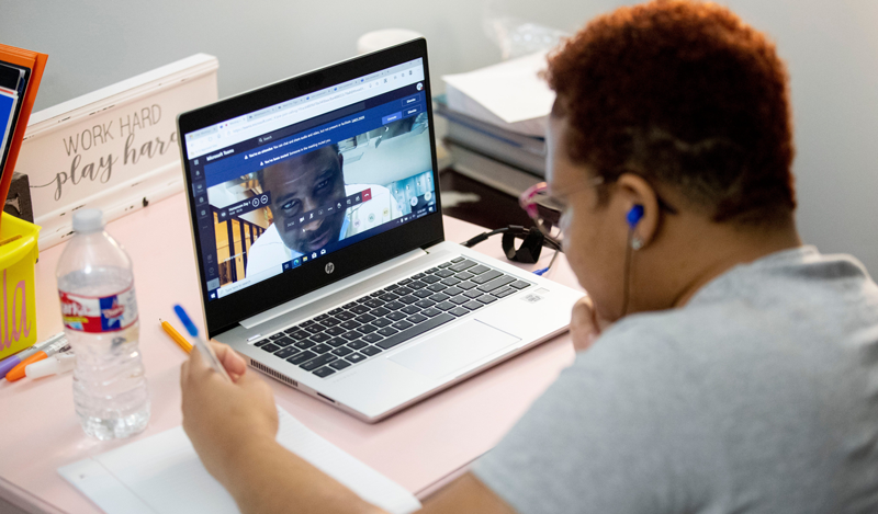 Khila Harris, 15, learns in a virtual classroom Monday, Aug. 31, 2020, at her home in Memphis.083120 Scsfirstday 08 Msg