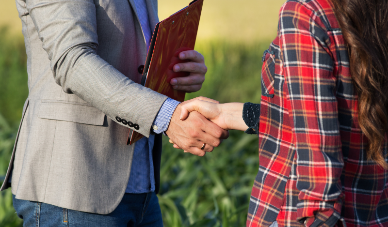 farmer shaking hands